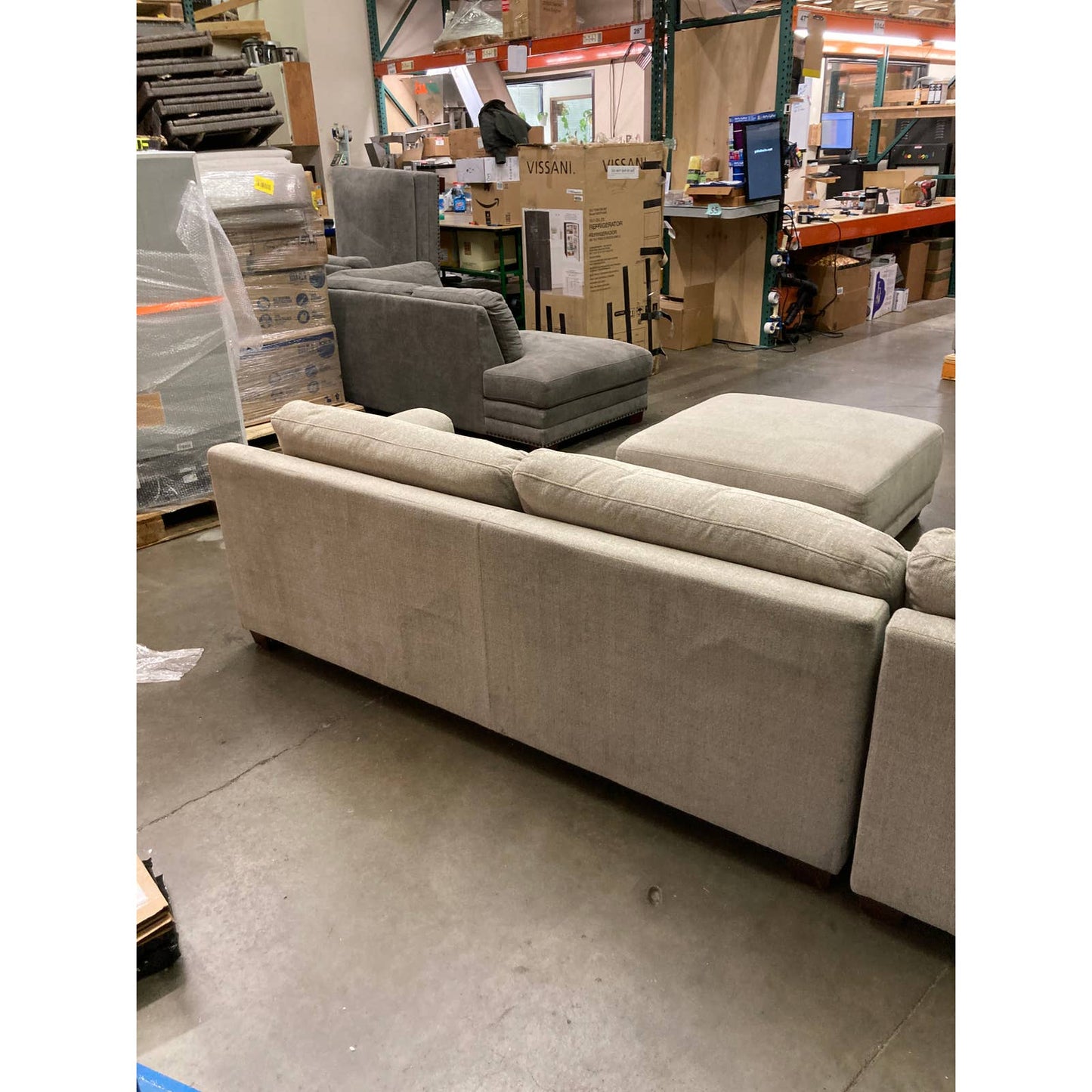Costco - Raylin Fabric Sectional with Ottoman - Retail $1599