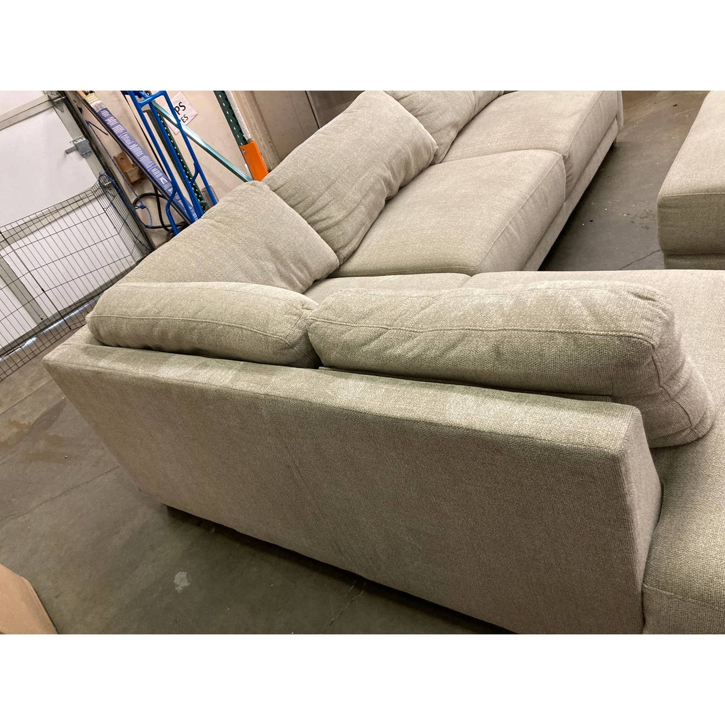 Costco - Raylin Fabric Sectional with Ottoman - Retail $1599