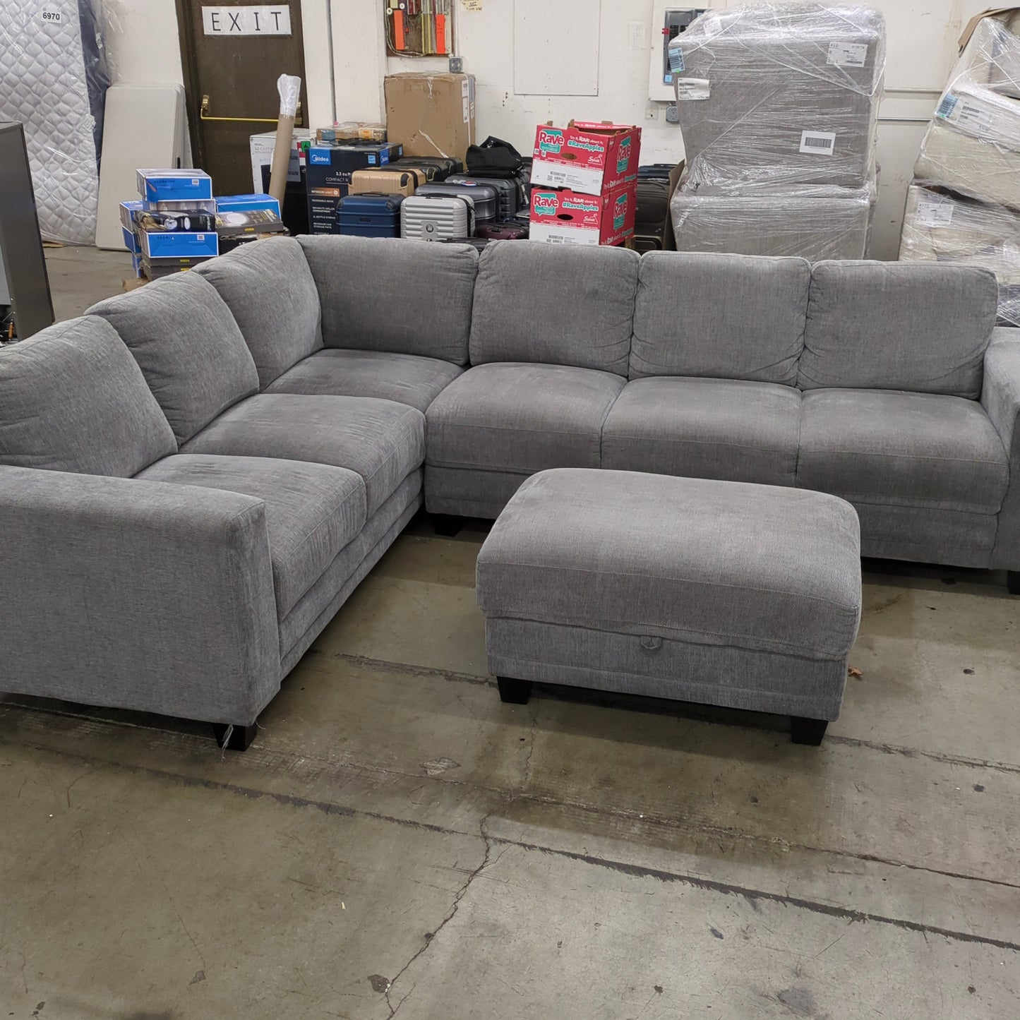 Santana Fabric Sectional with Storage Ottoman - Retail $1399