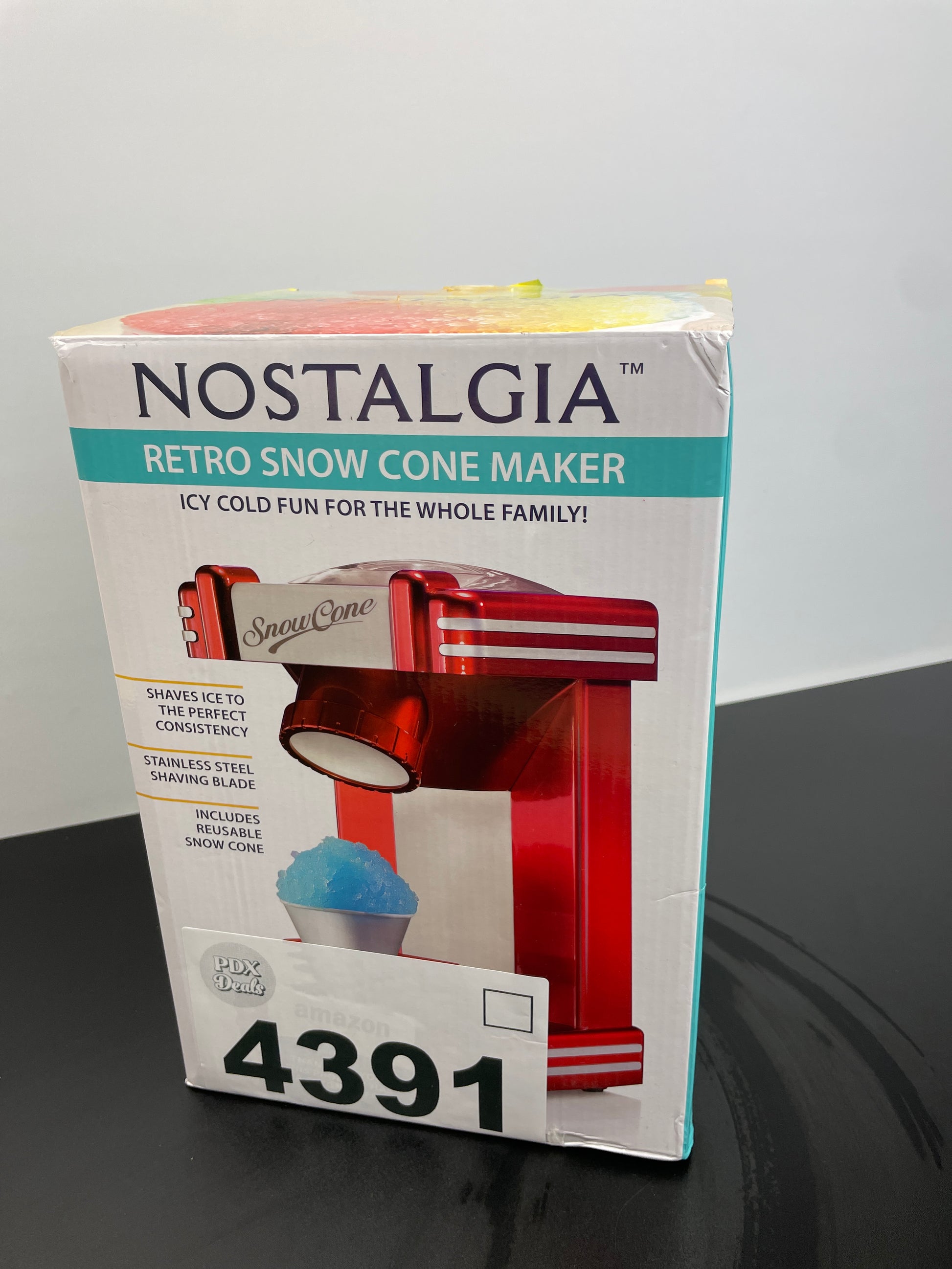 Nostalgia Snow Cone Shaved Ice Machine - Retro Table-Top Slushie Machine Makes 20 Icy Treats - Includes 1 Reusable Plastic Cup - Retro Red - Retail $37