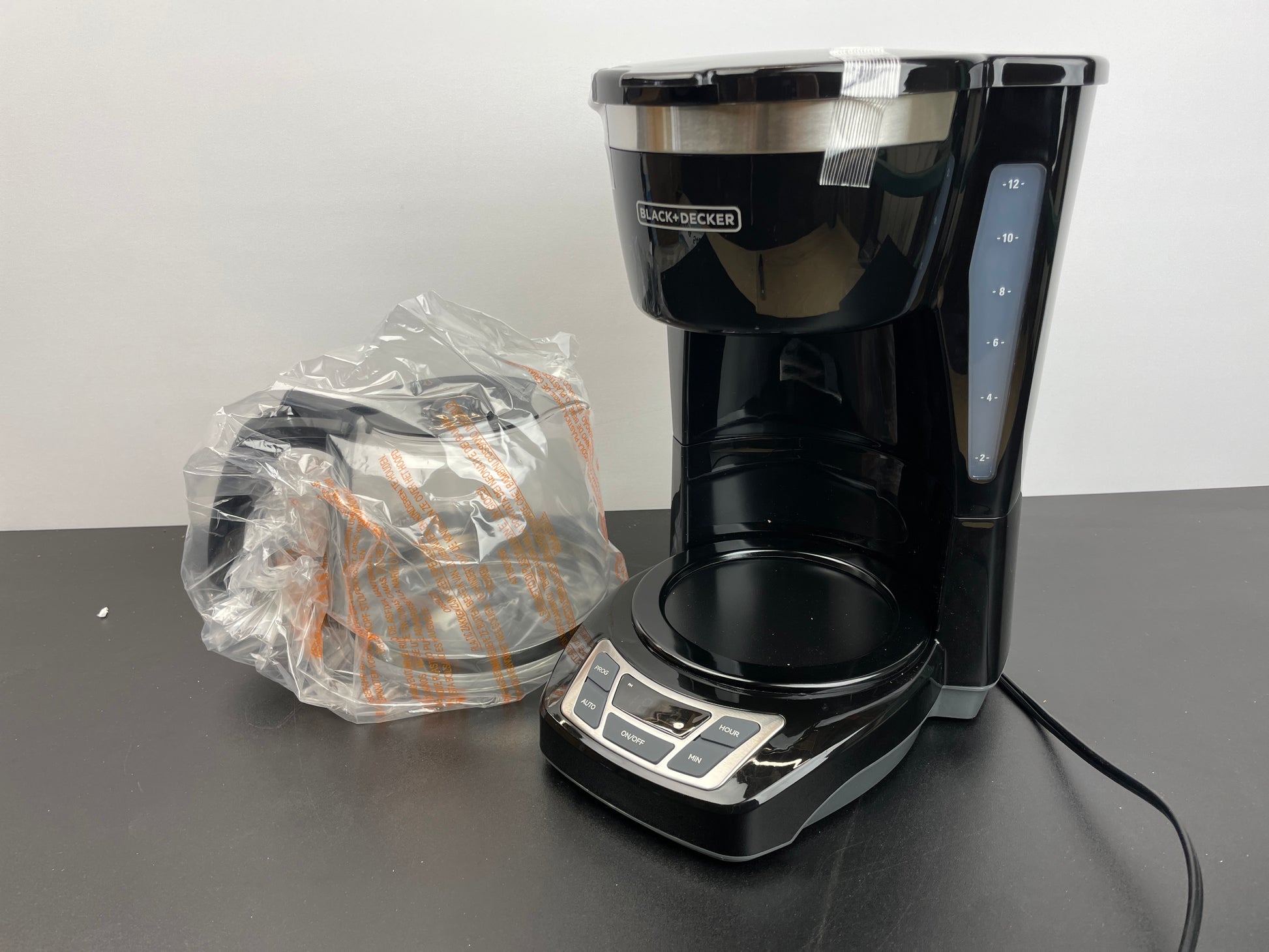 BLACK+DECKER 12-Cup Digital Coffee Maker, CM1160B, Programmable, Washable Basket Filter, Sneak-A-Cup, Auto Brew, Water Window, Keep Hot Plate, Black - Retail $34