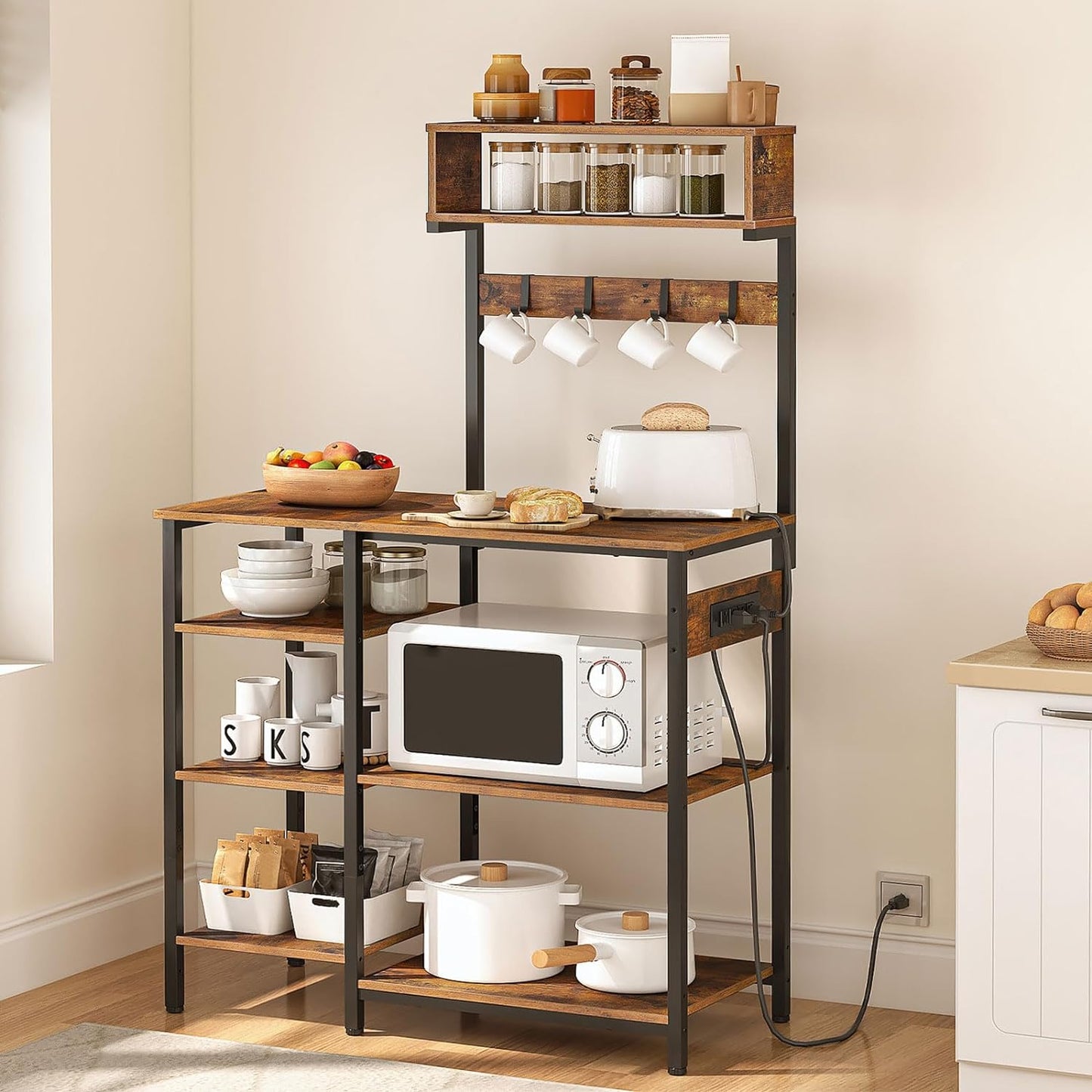 NEW - HOOBRO Bakers Rack with Power Outlet, 35.4 Inches Microwave Stand with 4 Hooks, 6 Tiers Kitchen Storage Shelf Rack, Coffee Bar Table, Rustic Brown and Black BF10UHB01 - Retail $99