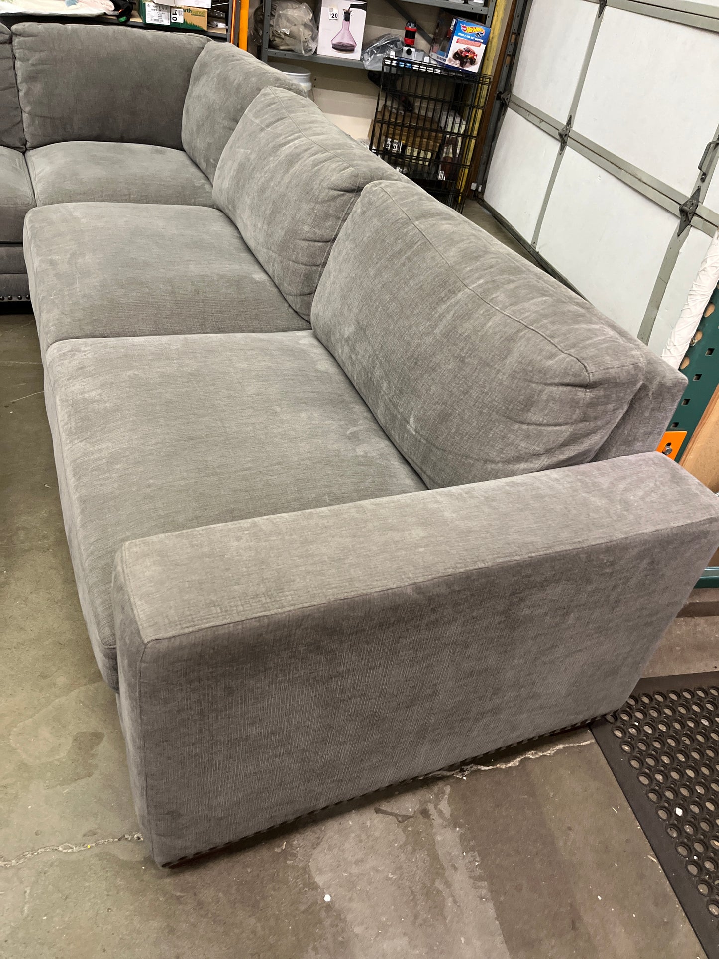 Costco - Penelope Fabric Sectional with Ottoman - Retail $1999